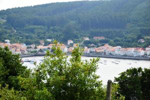 a view of a river with boats on it at O Mencer do Camiño in Cee
