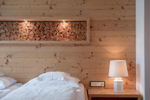 Postel nebo postele na pokoji v ubytování Hotel Seefelderhof