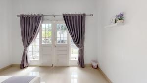Postel nebo postele na pokoji v ubytování Casa Blanca Gili Air