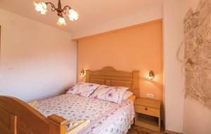 Postel nebo postele na pokoji v ubytování Vacation apartments Feniks