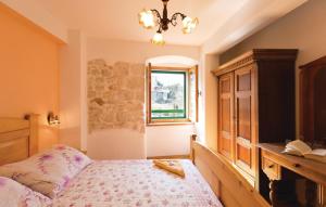Postel nebo postele na pokoji v ubytování Vacation apartments Feniks + 37 fotografií