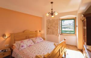 Postel nebo postele na pokoji v ubytování Vacation apartments Feniks