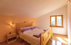 Postel nebo postele na pokoji v ubytování Vacation apartments Feniks