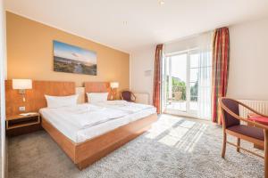 Postel nebo postele na pokoji v ubytování Hotel Königslinie