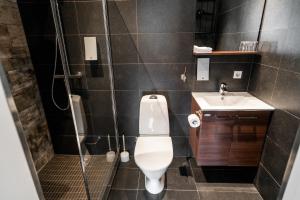 Ванна кімната в Frost and Fire Hotel