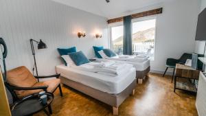 Ліжко або ліжка в номері Frost and Fire Hotel