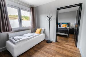 Ліжко або ліжка в номері Frost and Fire Hotel