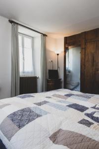 Voodi või voodid majutusasutuse Hôtel Le Besso - Swiss Romantic Lodge Zinal toas
