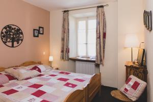 Voodi või voodid majutusasutuse Hôtel Le Besso - Swiss Romantic Lodge Zinal toas