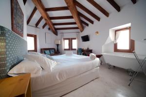 Posteľ alebo postele v izbe v ubytovaní Hotel Forn Nou