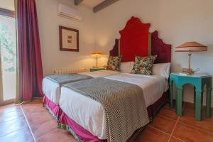 Posteľ alebo postele v izbe v ubytovaní La Casa del Torero