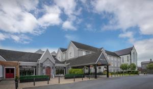 a row of buildings on a street at Temple Gate Hotel in Ennis