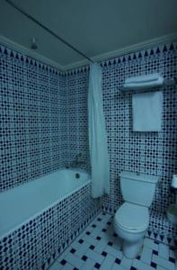 Ett badrum på Hotel Amalay