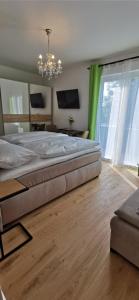 Katil atau katil-katil dalam bilik di Enjoyit Velden West