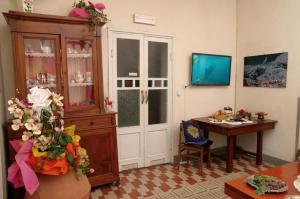 TV a/nebo společenská místnost v ubytování Albergo Ristorante Guidi