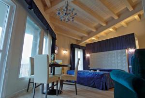 Postel nebo postele na pokoji v ubytování Boutique Hotel Calzavecchio