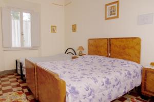Postel nebo postele na pokoji v ubytování Albergo Ristorante Guidi