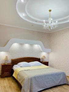 Postel nebo postele na pokoji v ubytování Hotel Palace Ukraine