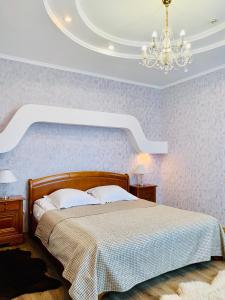 Postel nebo postele na pokoji v ubytování Hotel Palace Ukraine