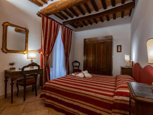 Posteľ alebo postele v izbe v ubytovaní B&B Siena In Centro - Diffuso