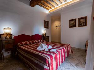 Posteľ alebo postele v izbe v ubytovaní B&B Siena In Centro - Diffuso