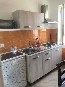 Köök või kööginurk majutusasutuses Casette sul Porto