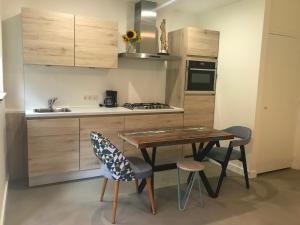 Fotografie z fotogalerie ubytování Natuurpark Hoefbos Boshuisje Veluwe v destinaci Otterlo