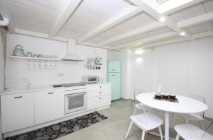 Kuchyňa alebo kuchynka v ubytovaní B&B da Tiffany + 20 fotografií