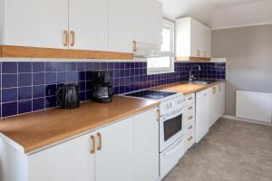 Kuchyň nebo kuchyňský kout v ubytování Hotel B&B Gränden