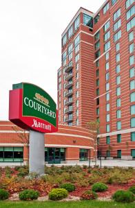 a court yard marriott sign in front of a building at Courtyard by Marriott Ottawa East in Ottawa