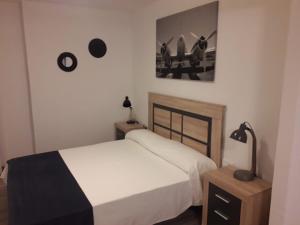 Postel nebo postele na pokoji v ubytování PARADISE FUERTEVENTURA
