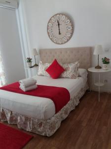 A bed or beds in a room at Casa de Huéspedes Prada