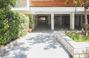 a hallway of a building with a walk way at Christina's flat in Athens
