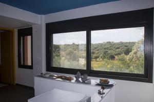 Φωτογραφία από το άλμπουμ του LIOFYTO - Stylish villa with views to Foinikounda bay σε Καμάρια