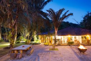 Um jardim em Eco Resort Hotel Villa São Romão
