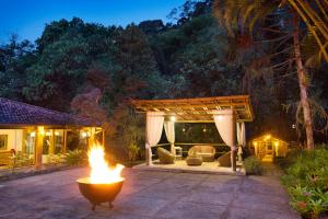 Um jardim em Eco Resort Hotel Villa São Romão