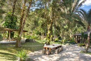 Um jardim em Eco Resort Hotel Villa São Romão