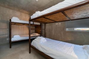 Postel nebo postele na pokoji v ubytování N1 Hostel Apartments and Suites