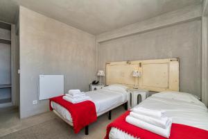 Postel nebo postele na pokoji v ubytování N1 Hostel Apartments and Suites