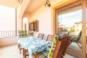 En balkon eller terrasse på Casa Vacanze Pedras + 27 billeder