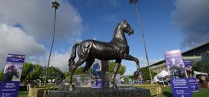 a statue of a horse standing in a park at Valley Hotel in Rosemead
