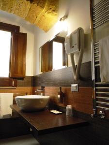 Kuchyň nebo kuchyňský kout v ubytování B&B Oreto Centro