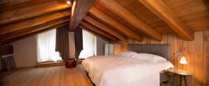 Postel nebo postele na pokoji v ubytování 3 Chalets Aparthotel
