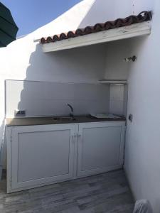 A cozinha ou cozinha compacta de wonderful white appartament in las Tortugas