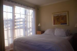 Krevet ili kreveti u jedinici u okviru objekta Hotel Manoir Atkinson