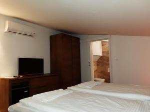 Postel nebo postele na pokoji v ubytování A7 Apartments