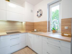 Kuchyňa alebo kuchynka v ubytovaní Apartament Happy Time SPA - Kołobrzeg