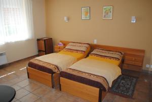 Postel nebo postele na pokoji v ubytování Motel - Hôtel La Poularde