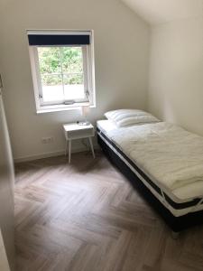 Postel nebo postele na pokoji v ubytování Villa Felix with sauna in Ermelo