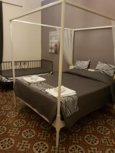 Łóżko lub łóżka w pokoju w obiekcie Happy Stay Guesthouse